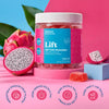 Jar of Bluebird Botanicals THC gummies with dragon fruit on a colorful background.; Flavor: Dragon Fruit;