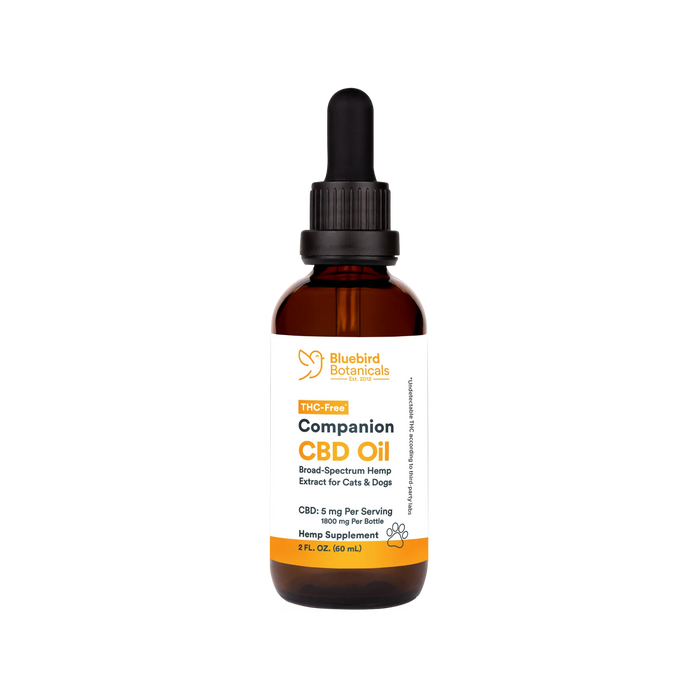 A bottle of Companion CBD Oil for Pets with a dropper, labeled with 5 mg of CBD per serving.